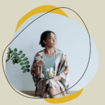 A young woman with a phone in her hand.