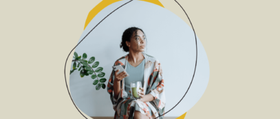 A young woman with a phone in her hand.