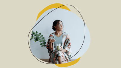 A young woman with a phone in her hand.