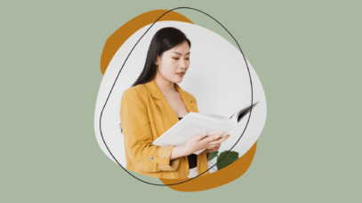 Woman looking through white folder.