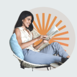 Woman reading 'The Slight Edge'